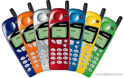 Seven Nokia 5110 phones fanned out in different coloured fascias